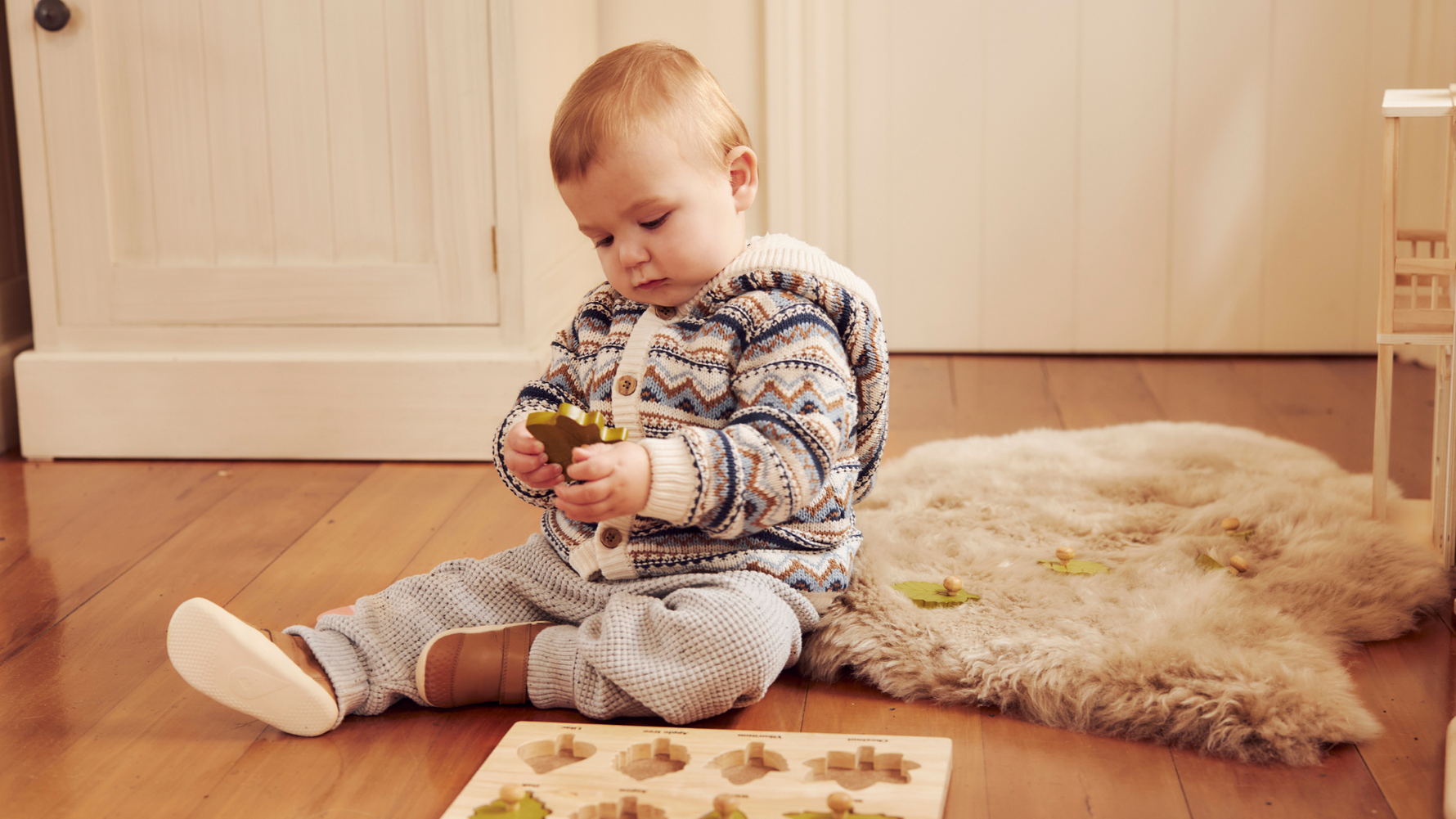 Scarpe primi passi Bobux a pianta larga per bambini di 1 anno