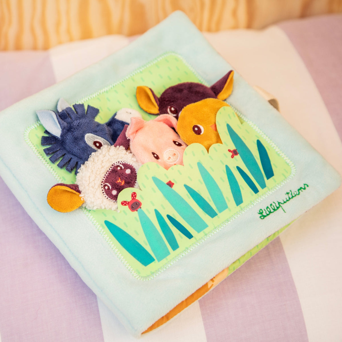 Libro di attività in stoffa Lilliputiens I Bambini, gioco da portare al ristorante e in viaggio