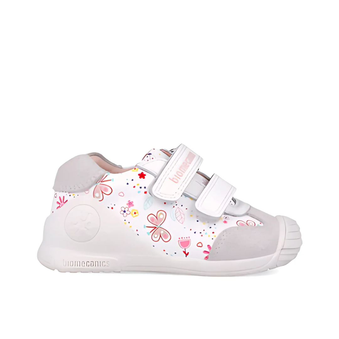 Scarpe primi passi Biomecanics bianche, con doppio strappo e suola flessibile con stabilizzatore posturale.