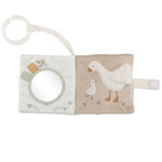 Libro di stoffa aperto con attività sonora e materiali scricchiolanti per stimolazione uditiva.