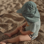 Cappellino da sole Little Dutch Ocean Green con visiera e protezione collo